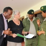 Karanja, FKF Deputy Chair Cristina Boelcke-Croze, KFS County Coordinator Stephan Kahunyo and Charity Munyasaya discuss the terms of the Agreement