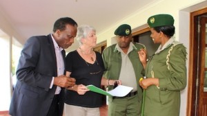 Karanja, FKF Deputy Chair Cristina Boelcke-Croze, KFS County Coordinator Stephan Kahunyo and Charity Munyasaya discuss the terms of the Agreement